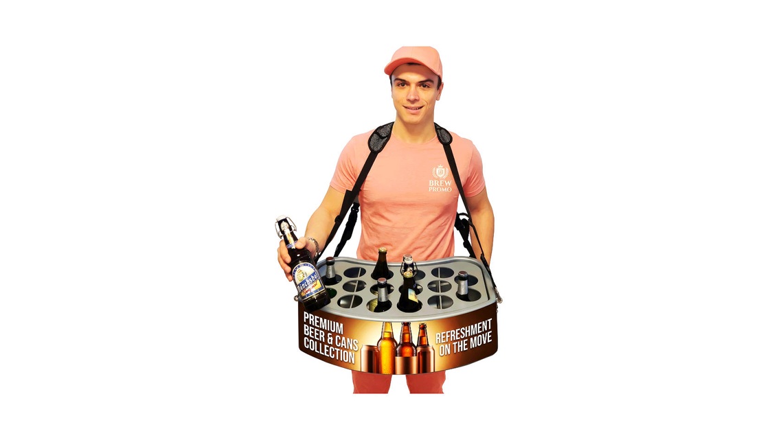 Ergonomic vending belly tray for flexible direct sales of snacks, beverages, and merchandise directly to customers at events.