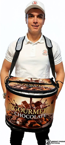 Coffee promoter offering takeaway drinks with a hawking tray during a street promotion.
