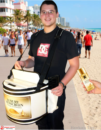 Glasgow live concert vendor using mobile hawker’s tray for beer sales and trade promotion enhancing audience experience.
