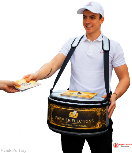 Portable vendor’s tray at New York Christmas Market offering coffee-to-go and sampling promotion for experiential catering and marketing activation.